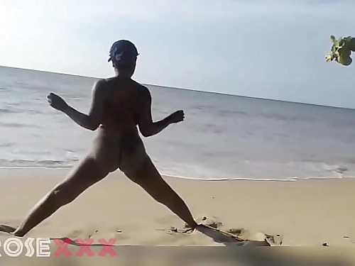 Ebony lady doing some workout nude on the beach